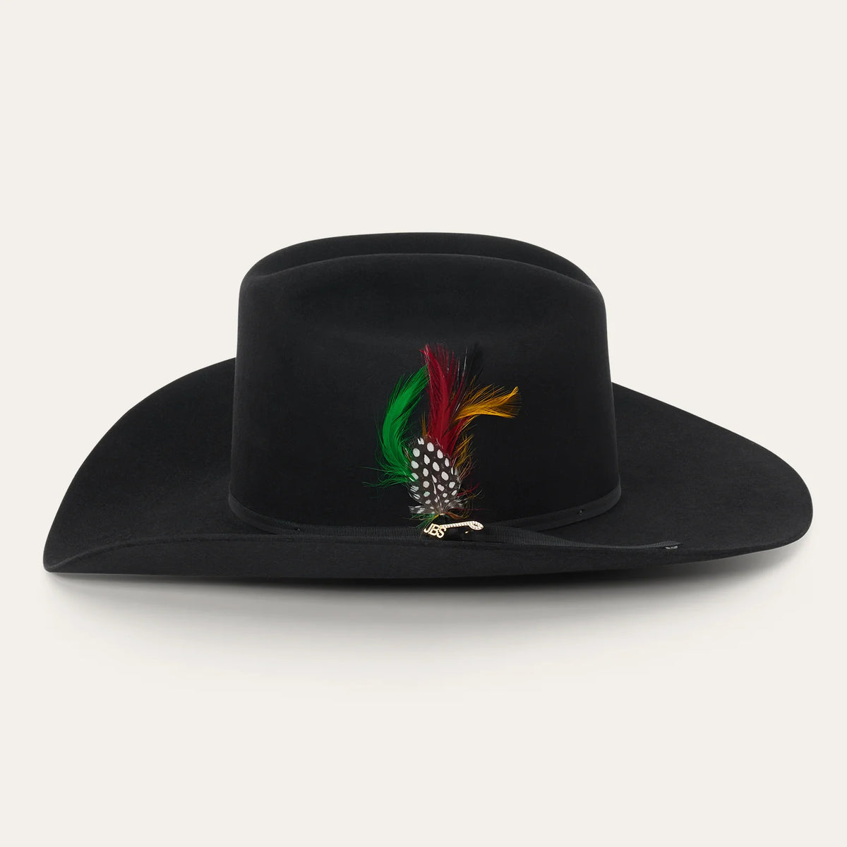 Side profile view of the Stetson Rancher 30X black cowboy hat showing the 2-ply cord band, colorful feather cluster, and JBS pin.