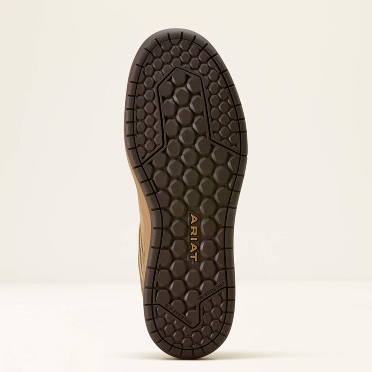 Close-up of a brown shoe sole with Ariat branding on a beige background
