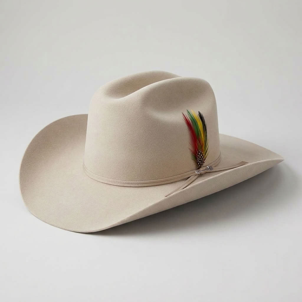 Three-quarter studio profile view of the Stetson 6X Spartan Silverbelly fur felt hat highlighting the Cattleman crown, ribbon band, and colorful feather detail.