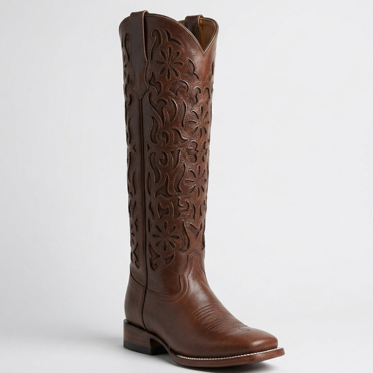 Lirac Toscana brown square toe cowgirl boot with intricate laser cut patterns on upper.