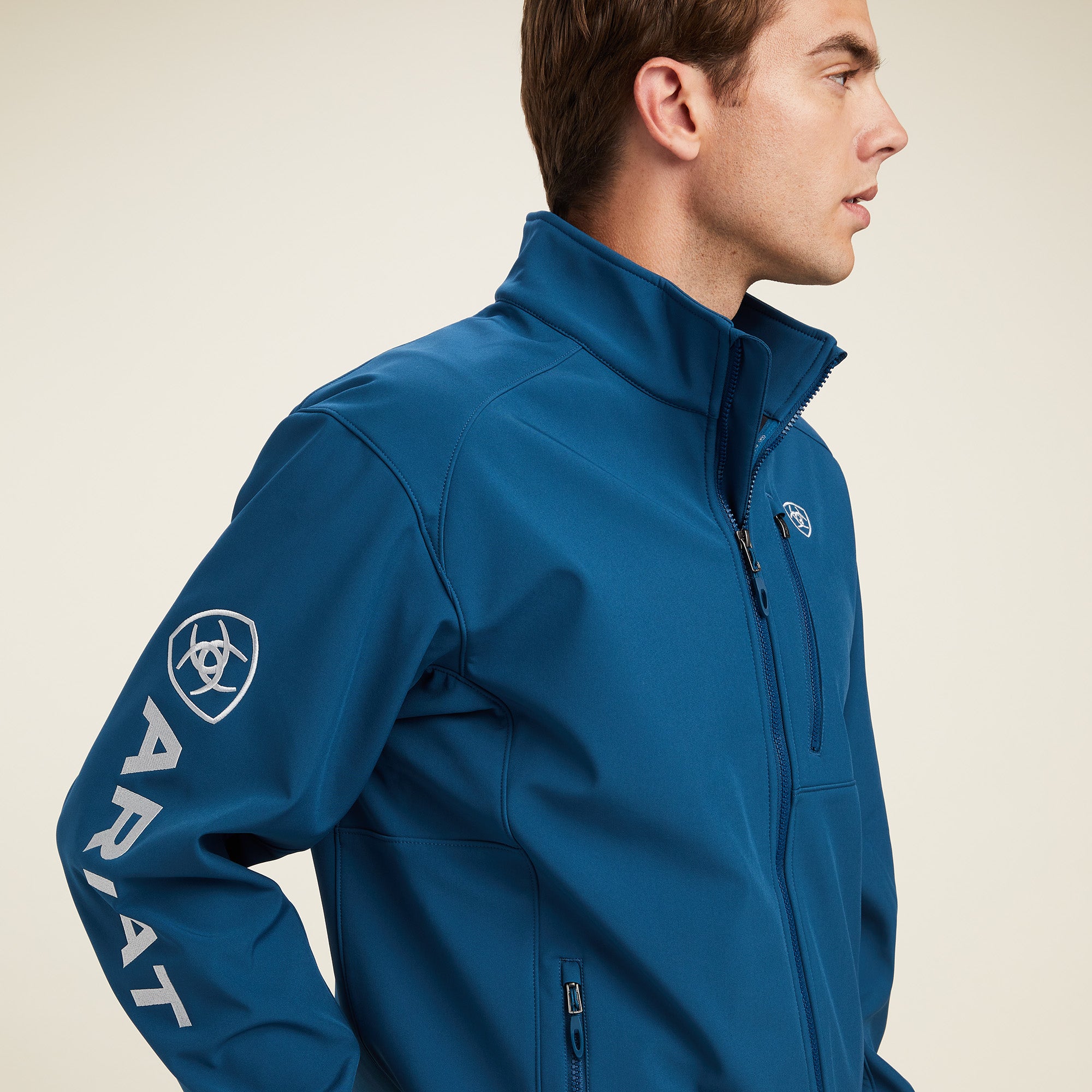 Image side view of Ariat Majolica Blue Softshell Jacket logo.